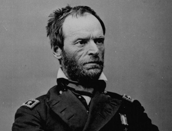 Generálmajor William T. Sherman sedel v modrej uniforme armády Únie.